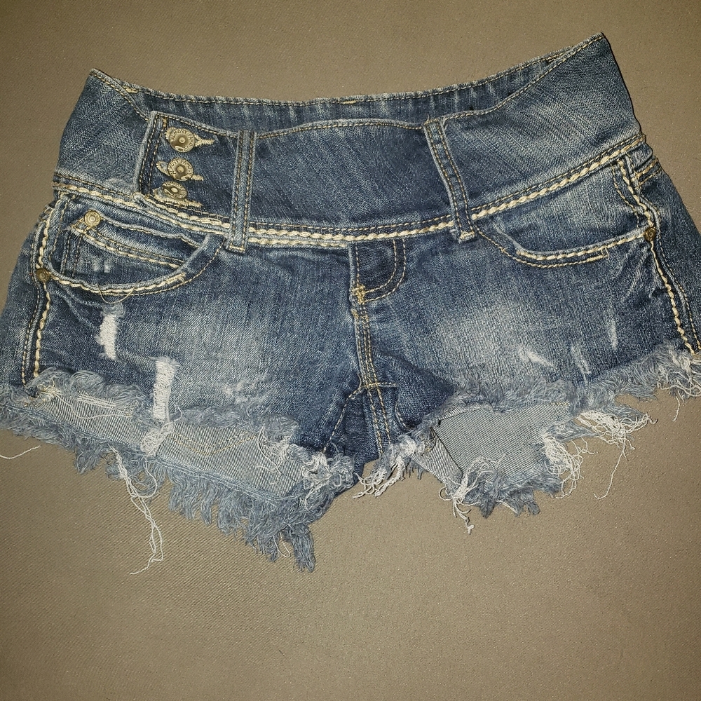 Distressed denim shorts